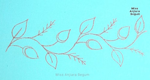 Hand-drawn embroidery pattern outline on pastel fabric