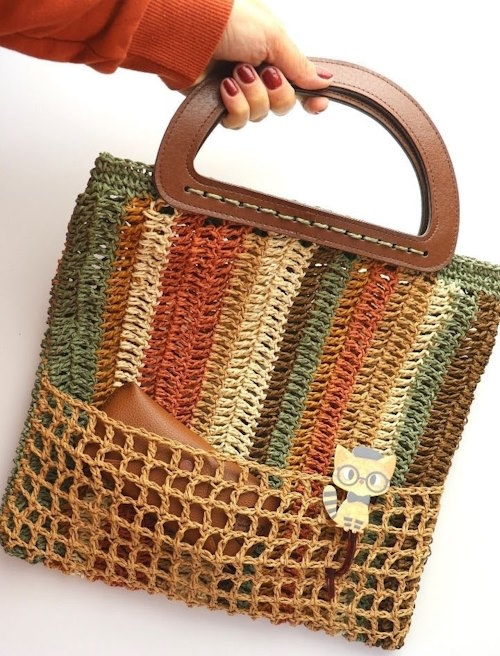 Crochet Paper Yarn Tote Bag – Easy Colorful DIY Tutorial Finished crochet paper yarn tote bag held in hand